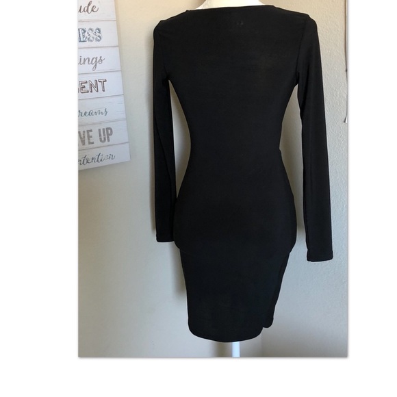 Black Dress With a Twist - Picture 4 of 7